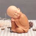 Zen little monk ornament in brown robe sleeping peacefully for desk decor - 1034-1 Resting on Knees