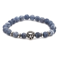 Detail of blue crackle agate bead bracelet featuring an intricate silver lion head charm - Lion Head