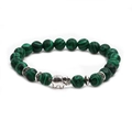 Detailed shot of malachite beads and silver elephant charm on a boho style bracelet - Elephant Accessory