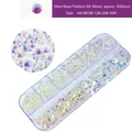 Detail view of mixed size AB crystals in a 12-slot storage box for nail art designs - Silver Bottom Nude AB (Approx 2000pcs Mixed)