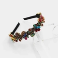 Dettaglio di cerchietto barocco con gemme colorate e accenti di rose in bronzo - Zircone Marquise