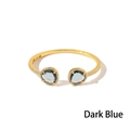 Bracciale rigido dorato con gemme blu inchiostro e dettagli in cristalli scintillanti - Oro + Blu Scuro