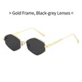 Occhiali da sole retrò cat eye con montatura in metallo dorato e lenti grigie - Montatura Oro Nero Grigio