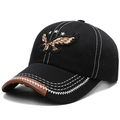 Black baseball cap with eagle embroidery and white contrast stitching detail - Adjustable / Black