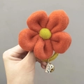 Elastico per capelli con fiore in feltro arancione fatto a mano e piccolo campanello d'oro - Arancione