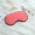 Pink silk sleep mask with black piping edge on white faux fur decorative background - Adjustable Buckle Paper Card Packaging / Watermelon red