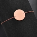 Polished rose gold stainless steel round disc bracelet with minimalist link chain - Rose Gold