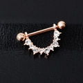 Elegant rose gold U-shaped nipple ring with sparkling diamond accents on black leather - Rose Gold