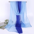 Detail of blue gradient silk scarf hanging on a metal rod with minimalist props - Blue Blue Gradient
