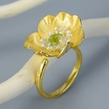 Luxurious S925 silver flower ring in golden finish with a vibrant green gemstone - Green