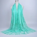 Detailed close-up of mint green lace shawl showing intricate floral patterns and fringe trim - 180cmx60cm / Peacock Blue