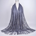 Macro shot of purple-gray lace scarf with hollow floral patterns and long fringe detail - 180cmx60cm / Grey