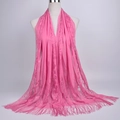 Detailed view of pink floral lace scarf featuring intricate hollow patterns and long tassels - 180cmx60cm / Watermelon Red
