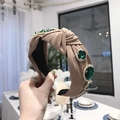 Baroque emerald gemstone knotted headband with crystals in khaki fabric material - Khaki