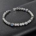 Verzilverde armband met lichtblauwe en witte zirkonia op zwarte lederen achtergrond - Aquamarijn & Zirconia Verzilverd (ca. 18 cm)