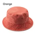 Retro washed cotton bucket hat in orange color with side metal ventilation eyelets - One Size / Orange