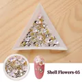 Shell flower-05 nail art set with iridescent petals, metallic beads and rhinestones - White AB
