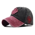 Close-up of vintage washed cotton baseball cap with red maple leaf and Canada embroidery - Burgundy