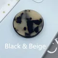 Collapsible phone grip with black and beige tortoise shell pattern on a white phone case - Expanding Stand / Beige