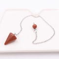 Brown goldstone pendulum pendant on silver chain displayed on white ceramic tray - Conical Stone + Silver Chain / Gold Sandstone