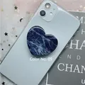Dark blue marble pattern heart-shaped folding phone grip stand shown on a blue smartphone - 09 Heart Marble Series-Dark Blue Marble
