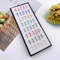L-shaped stainless steel nose stud set in multiple colors with sparkling crystal stones - Multi-Color Metal with White Rhinestones