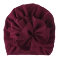 Detailed close-up of wine red baby turban hat with large 3D flower and knit texture - Burgundy
