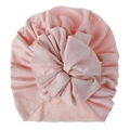 Close-up of pink knitted cotton baby turban with an oversized pleated flower detail - Pink