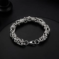 Mens titanium steel woven chain bracelet in silver finish on professional black display - Flower-Textured Woven Style / Width 9mm-Length 18cm