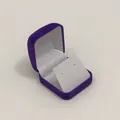 Detailed view of an open purple velvet earring jewelry gift box with white silk lining - Purple Exterior/White Interior/White Insert