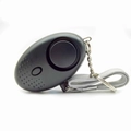 Personal safety alarm in black finish with grey lanyard and a metal keychain - Black