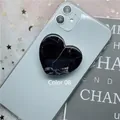 Collapsible heart shaped phone grip with black marble pattern, shown as color variant 08 - 08 Heart Marble Series-Black