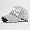 Close-up of 3D embroidered Boston logo on grey cotton twill baseball cap with curved brim - Adjustable / Gray