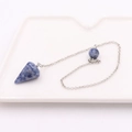 Natural blue stone cone pendulum necklace with silver chain and bead on ceramic tray - Conical Stone + Silver Chain / Blue Sodalite