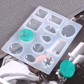 Silicone resin mold for DIY jewelry with water drop and square shapes on gray fabric - 50-321-D (Geometric Puzzle with Holes)