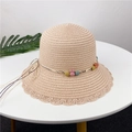 Beige woven straw sun hat for girls featuring colorful beads and a cute pink bunny ornament - S (50-52cm) / Light Pink