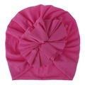 Detail of rose pink baby turban hat featuring a large layered pleated flower design - Rose Red