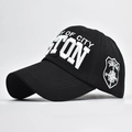 Detail of 3D embroidery and side compass patch on a black cotton baseball cap - Adjustable / Black
