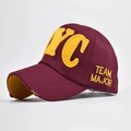 Close-up of distressed brim and yellow NYC felt patch on burgundy cotton baseball cap - Adjustable / NYC Wine Red