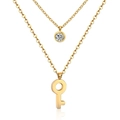 Double-layered golden necklace featuring a key pendant and crystal ring charms - Key/Gold