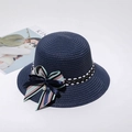 Navy blue straw sun hat with striped bow ribbon and pearl accent for summer travel - Adult M / Navy Blue
