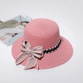 Pink straw sun hat with decorative black and white ribbon and pearl bow detail - Adult M / Pink