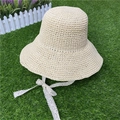 Beige woven straw sun hat with wide white lace ribbon tie and rounded crown - Adult M / Beige