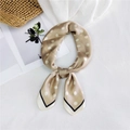 Champagne silk scarf with white polka dots and black border tied in a bow knot - Khaki Polka Dot