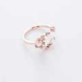 Detail of rose gold open ring featuring a crescent moon with pink zircon stones - 11#12956A (Pink)