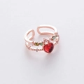 Detail of rose gold open ring featuring a red heart stone and micro-set floral accents - 20#12961B (Red)