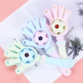 Three-piece set of plastic palm hand clapper toys in pastel pink, blue, and green colors - Soccer Hand Clapper Rattle