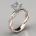 Roségoldener Unendlichkeitsring mit Kissen-Schliff-Edelstein und gedrehter Diamant-Bands - US 6 / Roségold