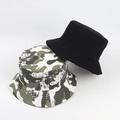 Detail of reversible camouflage and black bucket hat showing fabric texture and neat stitching - Army Green/White
