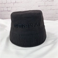 Classic black bucket hat featuring white 3D letter embroidery on soft canvas fabric - One Size / Black